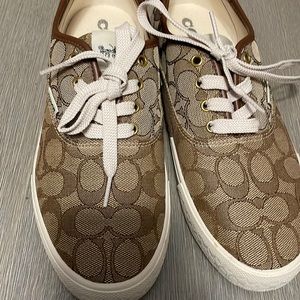 Monogram coach sneakers size 8. Brand new, never worn